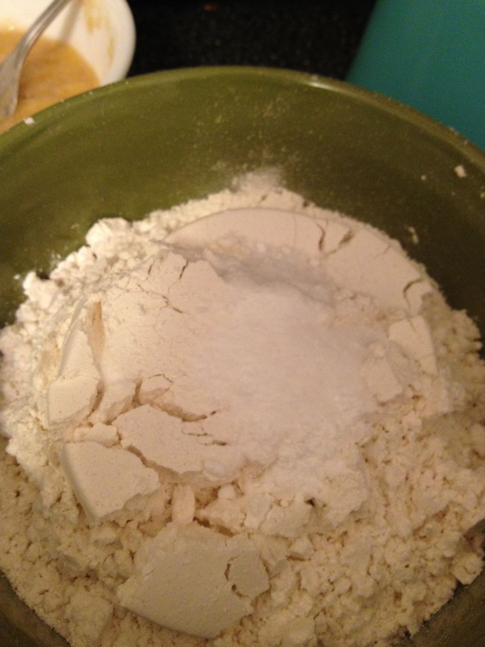 Combine dry ingredients. And start mashing them bananas! I used only one banana and it wasn't fully a cup, but the cupcakes were still good!