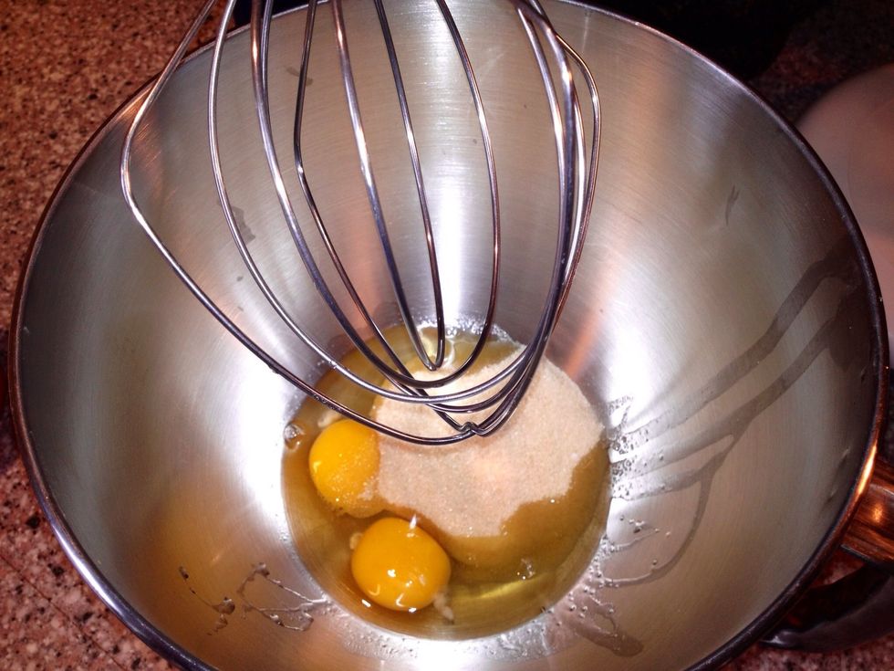 Combine egg and sugar in mixing bowl and whisk away