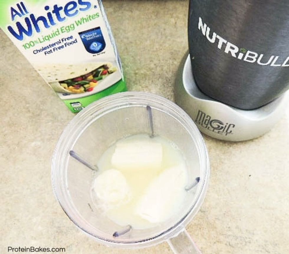 Combine egg whites and banana in a blender cup.