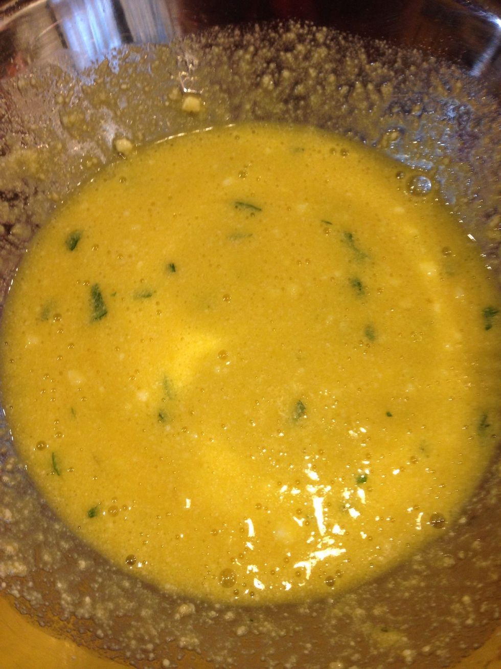 Combine Eggs, Parmesan cheese, and parsley