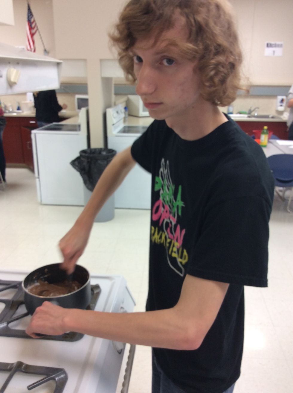 Combine flour, sugar, baking soda, and salt. Add to cocoa mixture. Stir in sour cream until smooth.