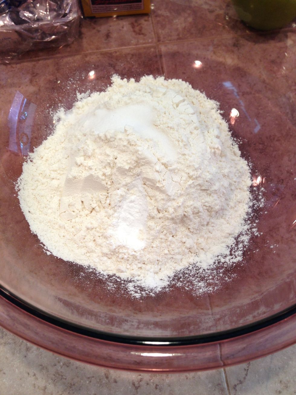 Combine flour, sugar, salt, and baking powder in a bowl.