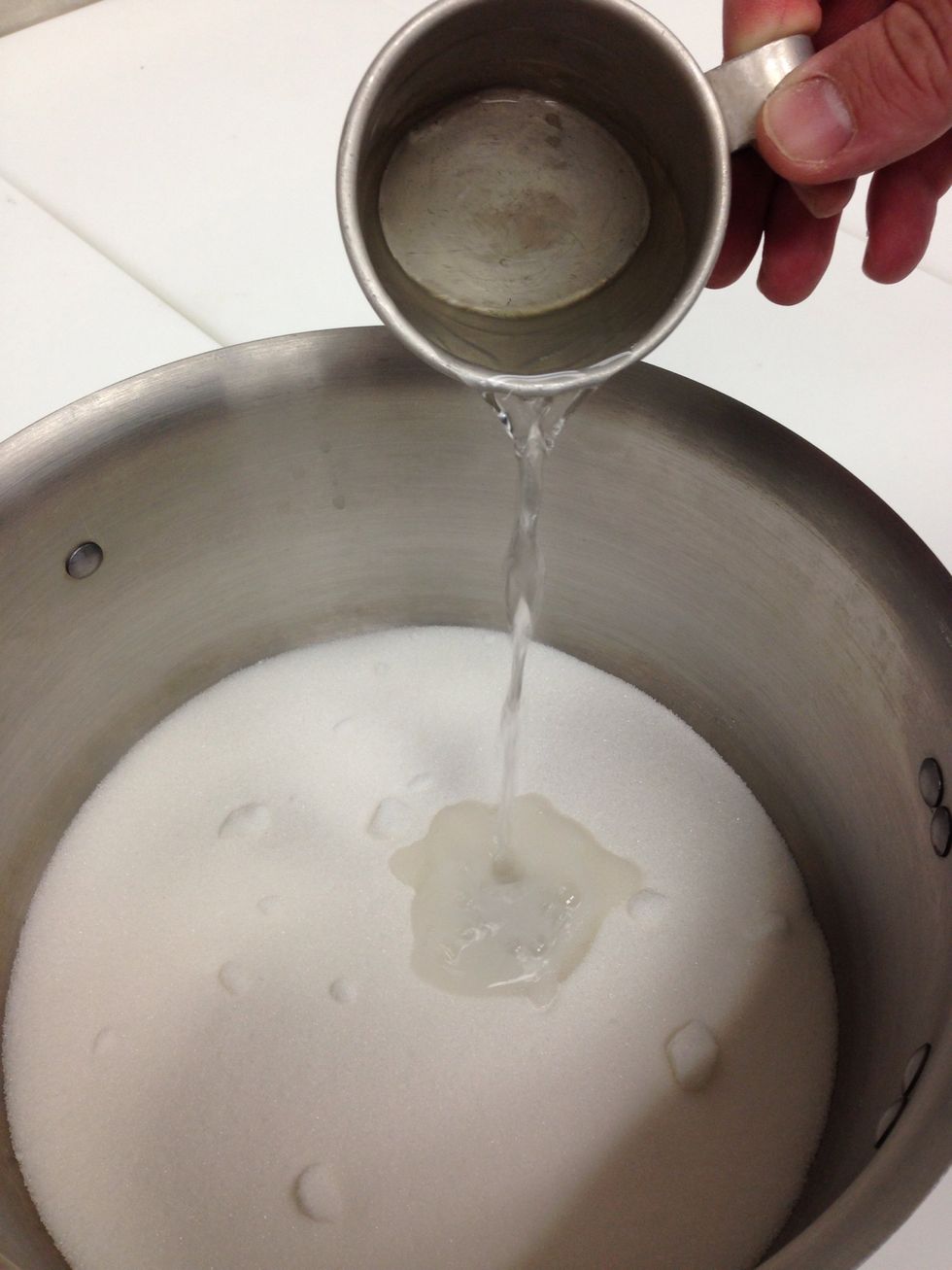 Combine granulated sugar and water.