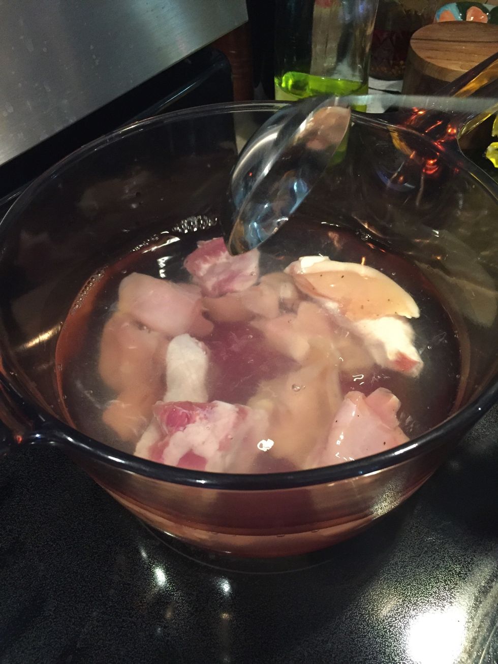Combine pork, chicken, 1tsp salt, 1/2 tsp of raw sugar, 2tbs of fish sauce, 1tsp of chicken bouillon, 1 knob of ginger and bring to a boil. Skim then simmer for 30 minutes.
