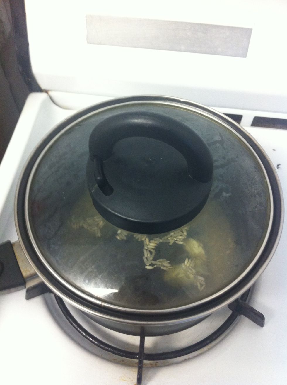 Combine rice and some of the stock in a pan, bring to boil, cook until rice is done. (I'm using brown rice so for me, it takes a while to cook!)