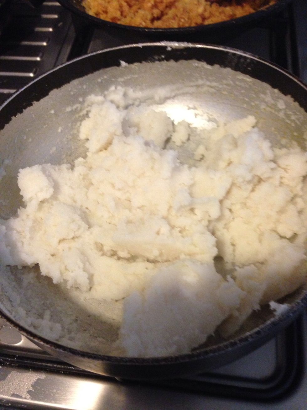 Combine rice flour & warm water in the pan over a stove. It should form a sticky but not runny dough. You can add more water if needed. Cook for 5-7 mins. Stop the stove & cover the pan