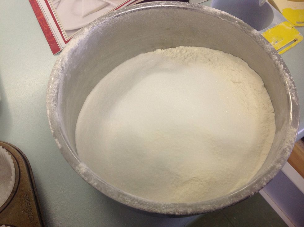 Combine sugar and flour.