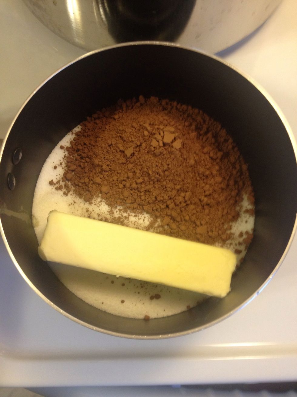 Combine sugar, cocoa, butter (applesauce) and milk in a saucepan.