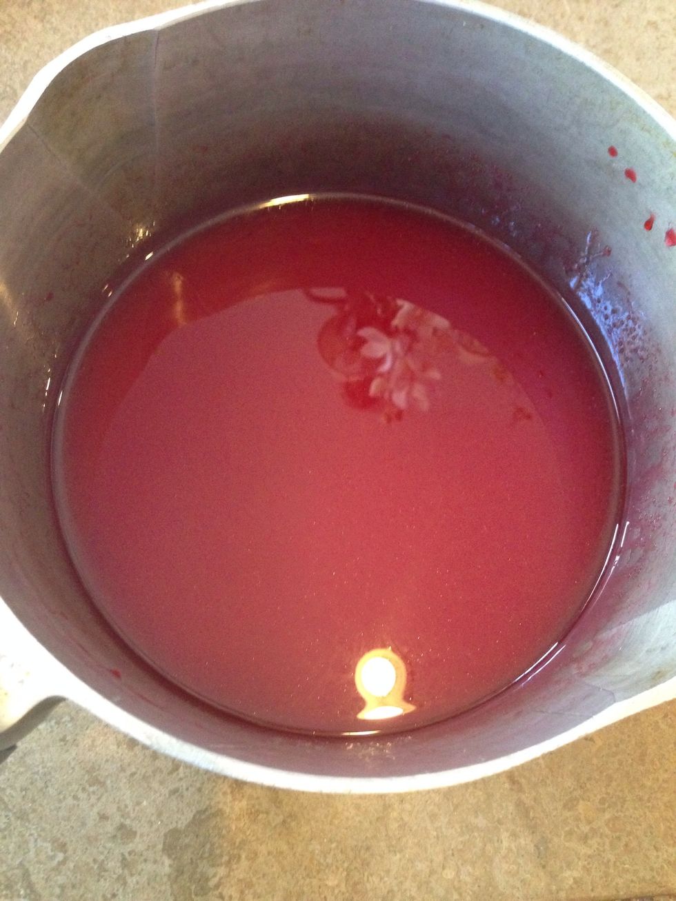 Combine sugar, corn syrup, water, food coloring and flavorings and stir until blended.