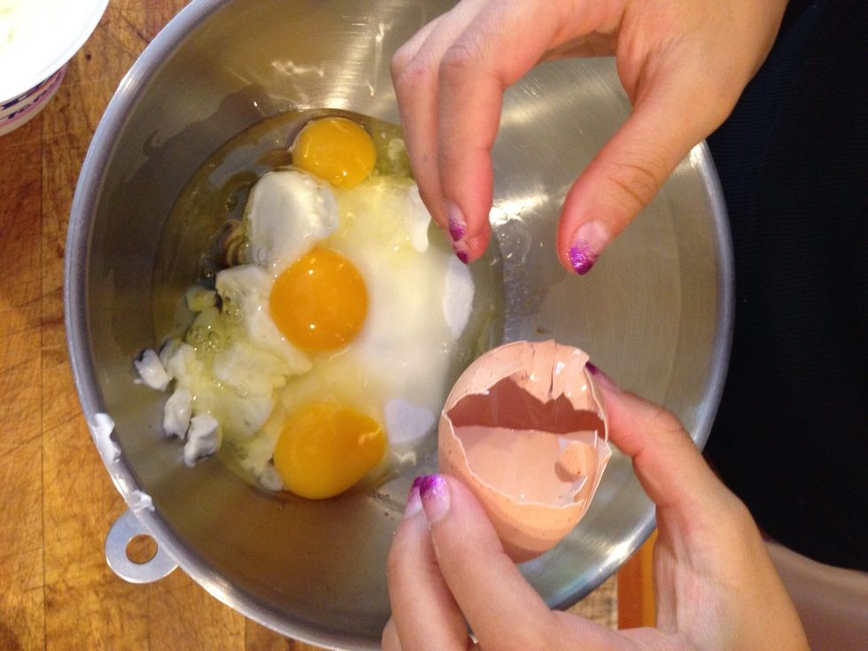 Combine sugar, vanilla, lemon zest, juice and oil in a bowl. Crack in eggs!