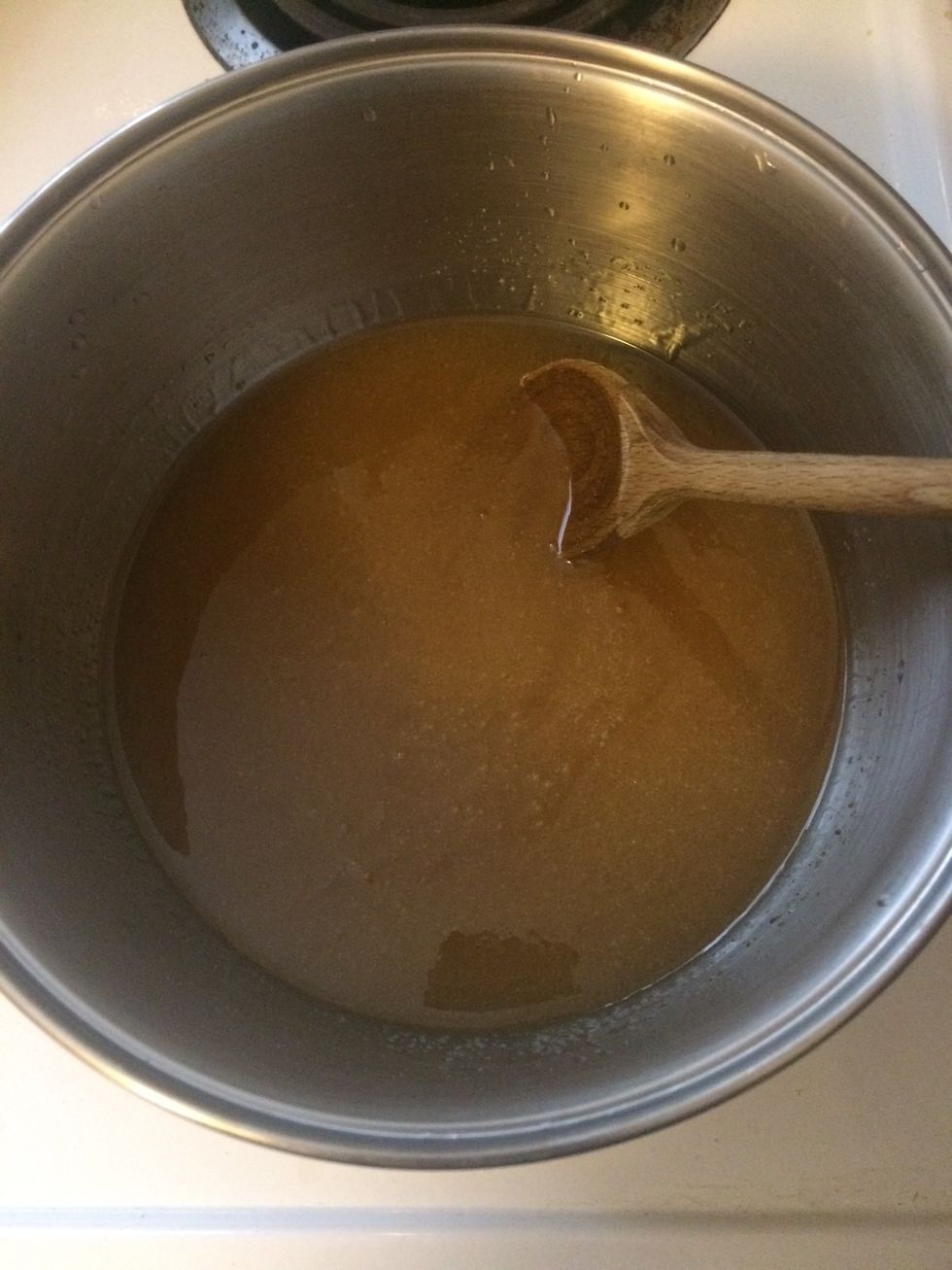 Combine sugar with corn syrup and tequila in a large, heavy bottom saucepan over medium high heat. Bring to a boil, stirring until sugar is dissolved.