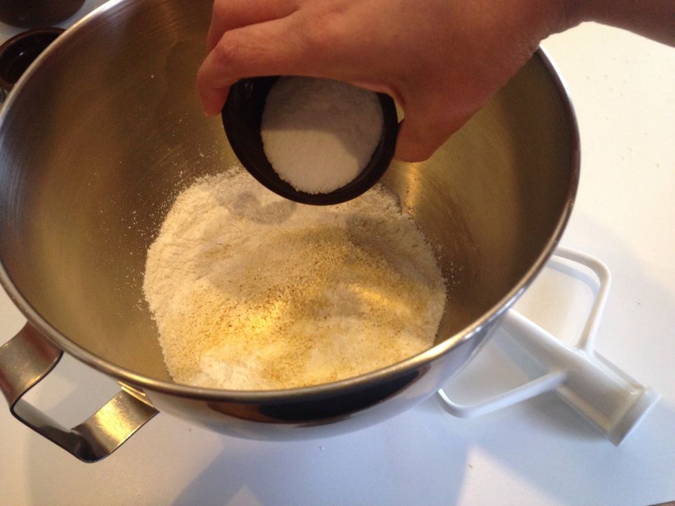 Combine the 30 g sugar with the sifted flour mixture in the bowl of the stand mixer. Use the paddle attachment to combine for 30 seconds.