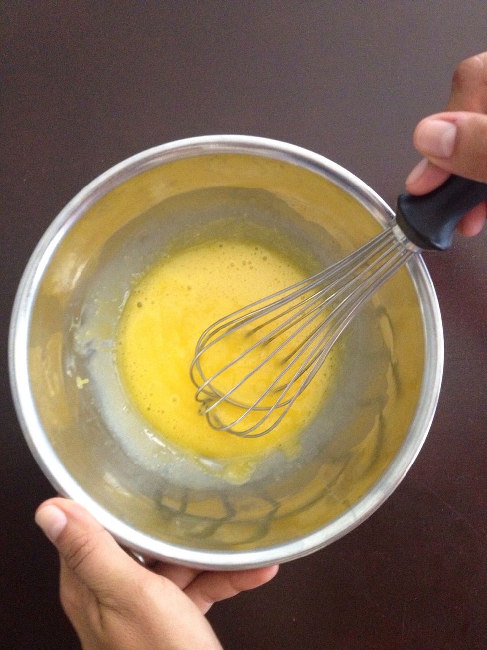 Combine the 4 yolks and lemon juice in a bowl. Whisk vigorously to combine.