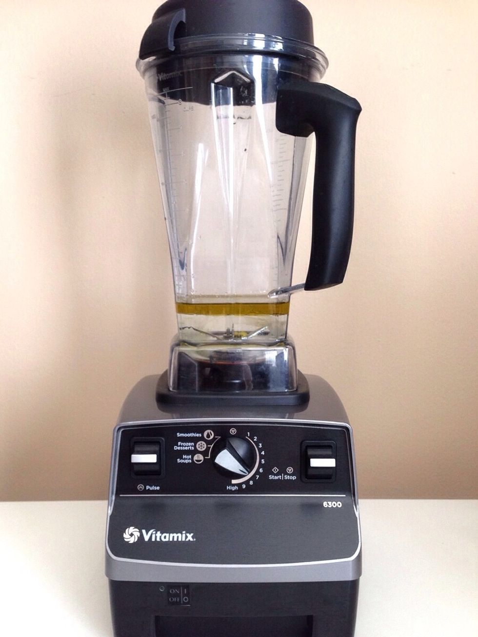 Combine the aloe vera jelly, water, and olive oil in a blender.