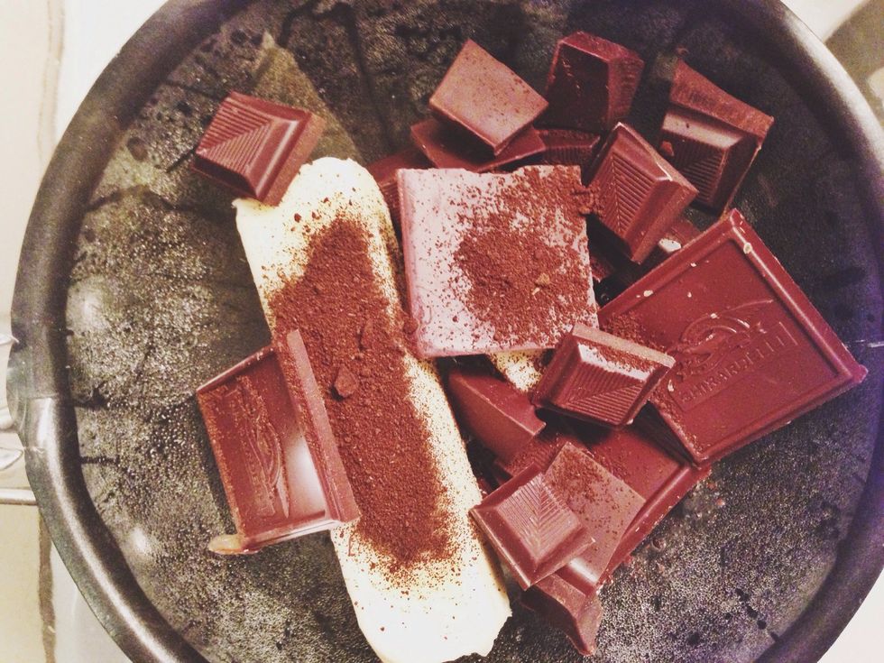Combine the butter, chocolate and espresso powder in a heatproof bowl set over a pot of barely simmering water. Stir until melted and smooth, and then remove from the heat and let cool 5 minutes.