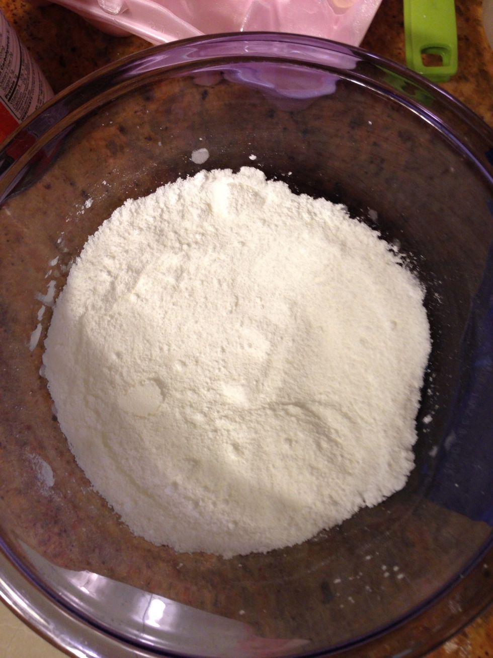 Combine the cornstarch with the sugar in a mixing bowl.