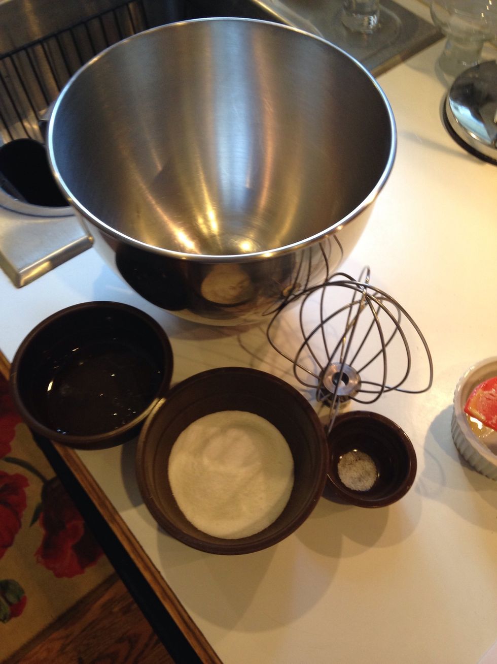 Combine the egg whites, 70g sugar, and sea salt in the clean bowl. Use the whisk attachment and whip for 3 minutes on medium speed to achieve soft peaks.