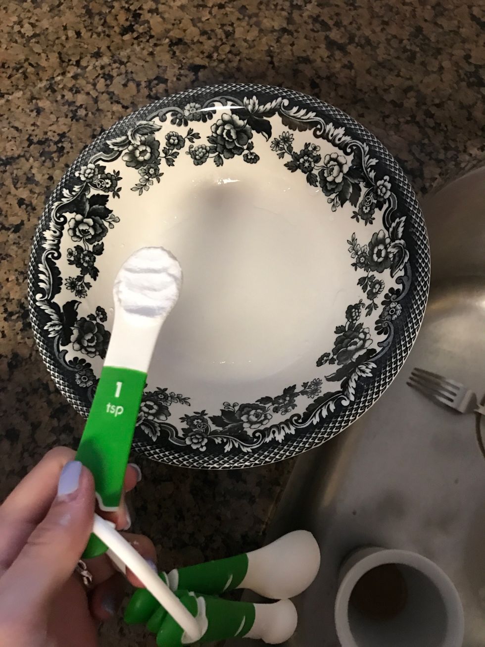Combine the hot water and the baking soda, letting the baking soda dissolve in the hot water before adding it to the mixture. Stir if needed