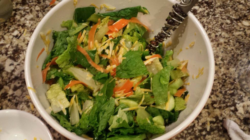 Combine the ingredients to make a salad.