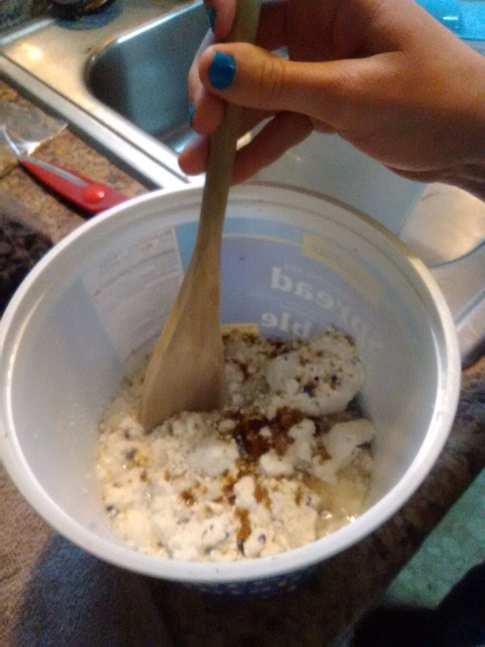 Combine the muffin mix, half a cup of water, and one teaspoon of brown sugar in a mixing bowl and stir