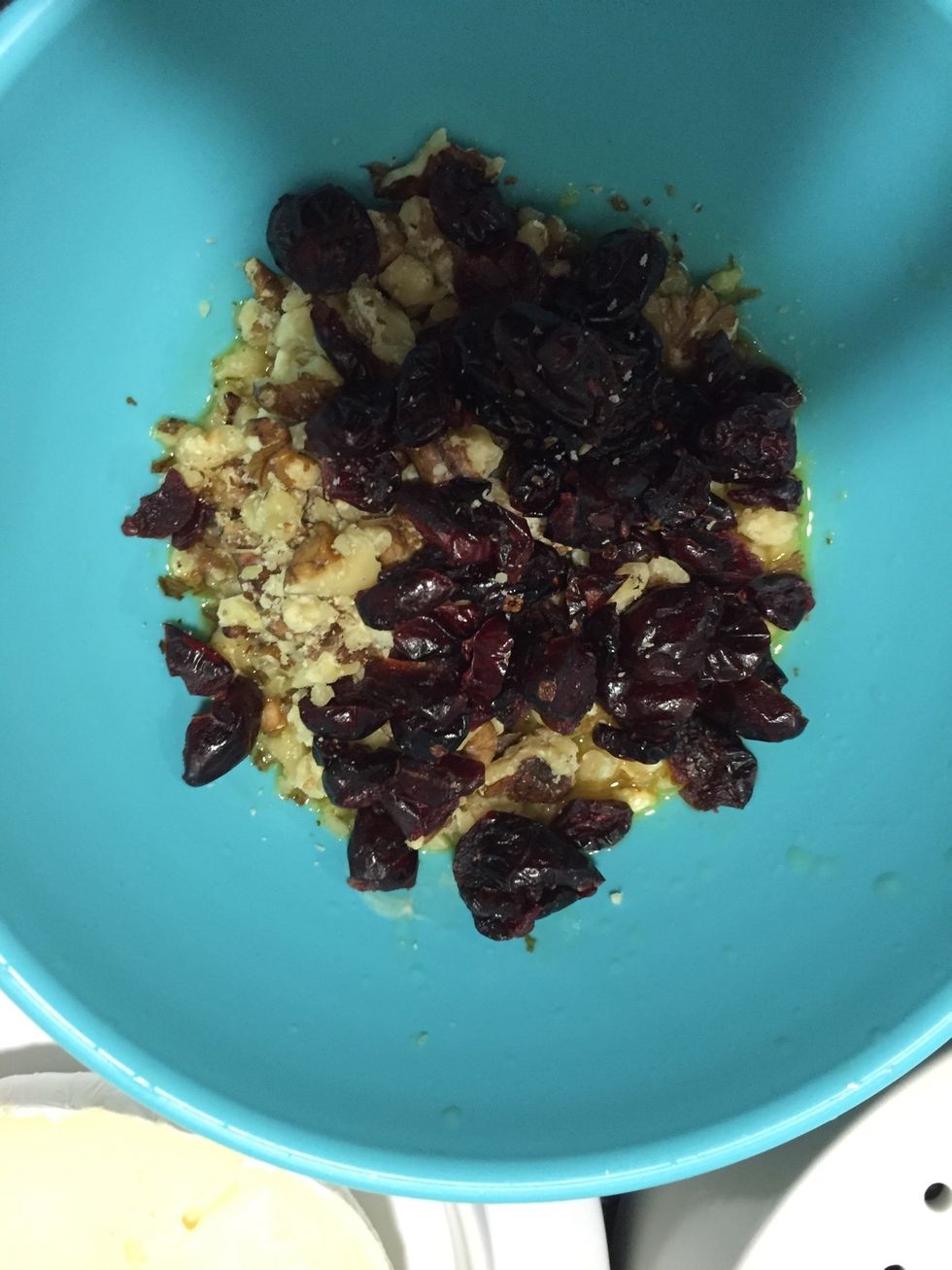 Combine the nuts, cranberries butter and sugar