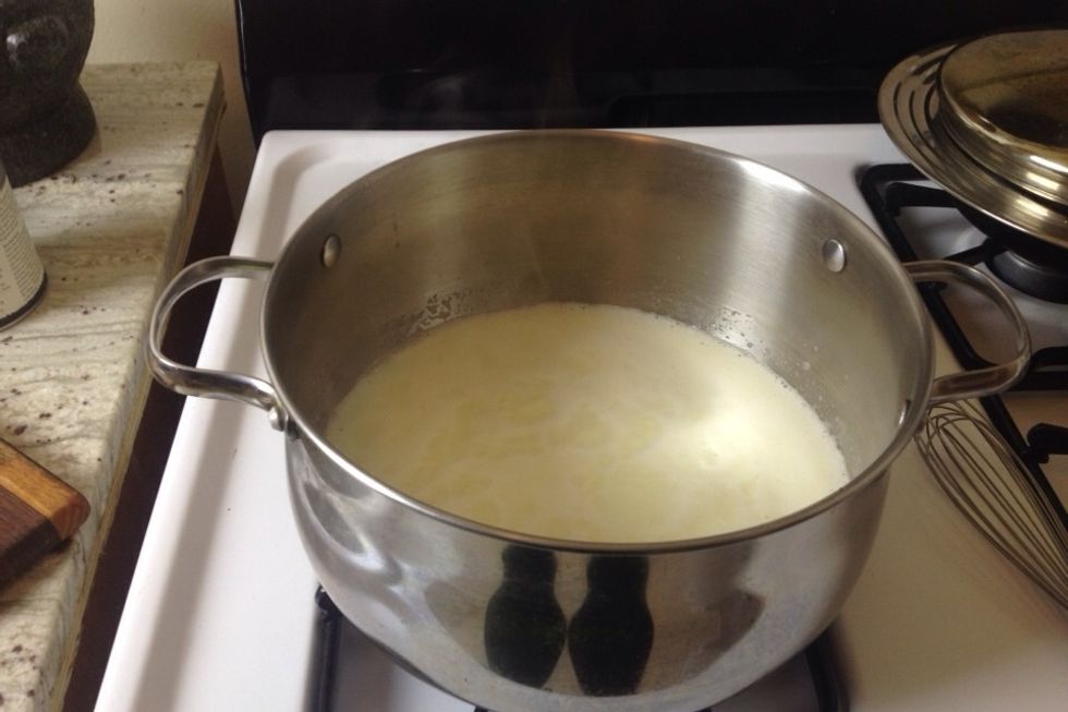 Combine the remaining milk, the cream, sugar, and corn syrup in a 4-quart saucepan, bring to a rolling boil over medium-high heat, and boil for 4 minutes.
