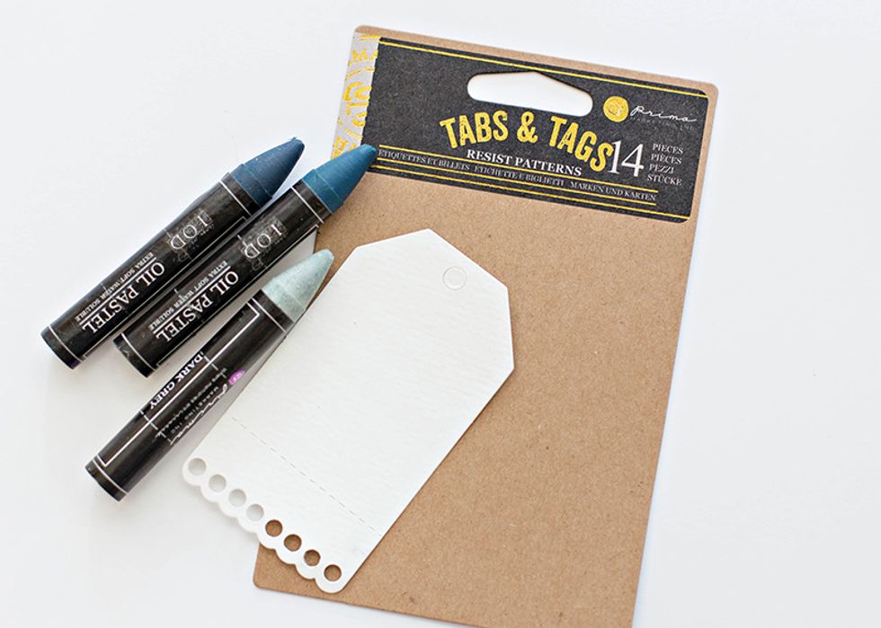Combine the resist tags and the Oil Pastels to create a quick project. Select Dark Grey, Cobalt Green, & Prussian Blue oil pastels.