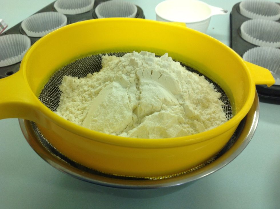 Combine the sifted flour, sugar and chocolate bits in a bowl. I use white chocolate but you can use any type