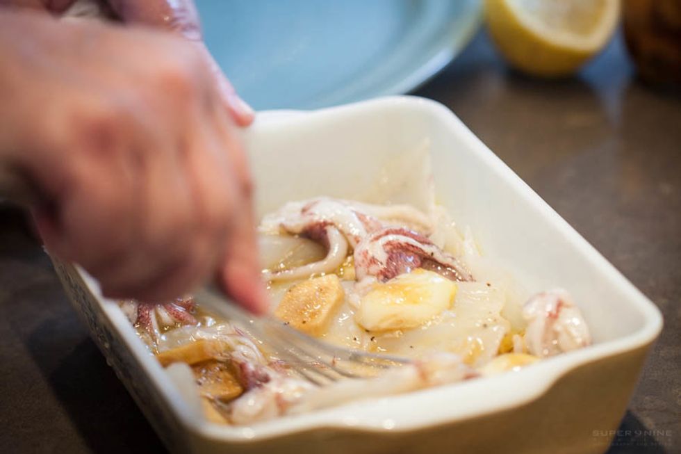 Combine the squid with the marinade until thoroughly coated.