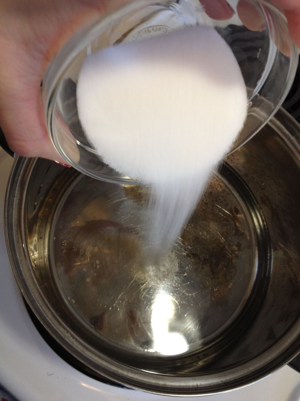Combine the water, 1/4 cup white sugar, salt and 3 tbsp oil in a pot over medium heat