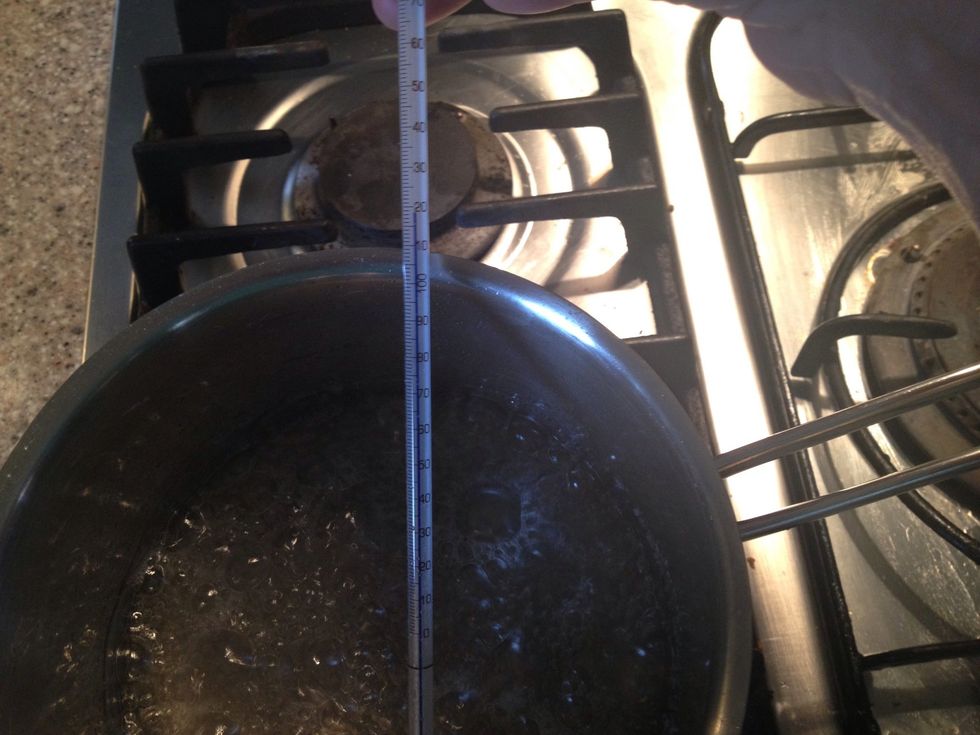 Combine the water and sugar and heat it up to 250\u00b0F/120\u00b0C. It takes about 10-15 minutes to reach this temperature. Do not stir as that will cause crystals to form.