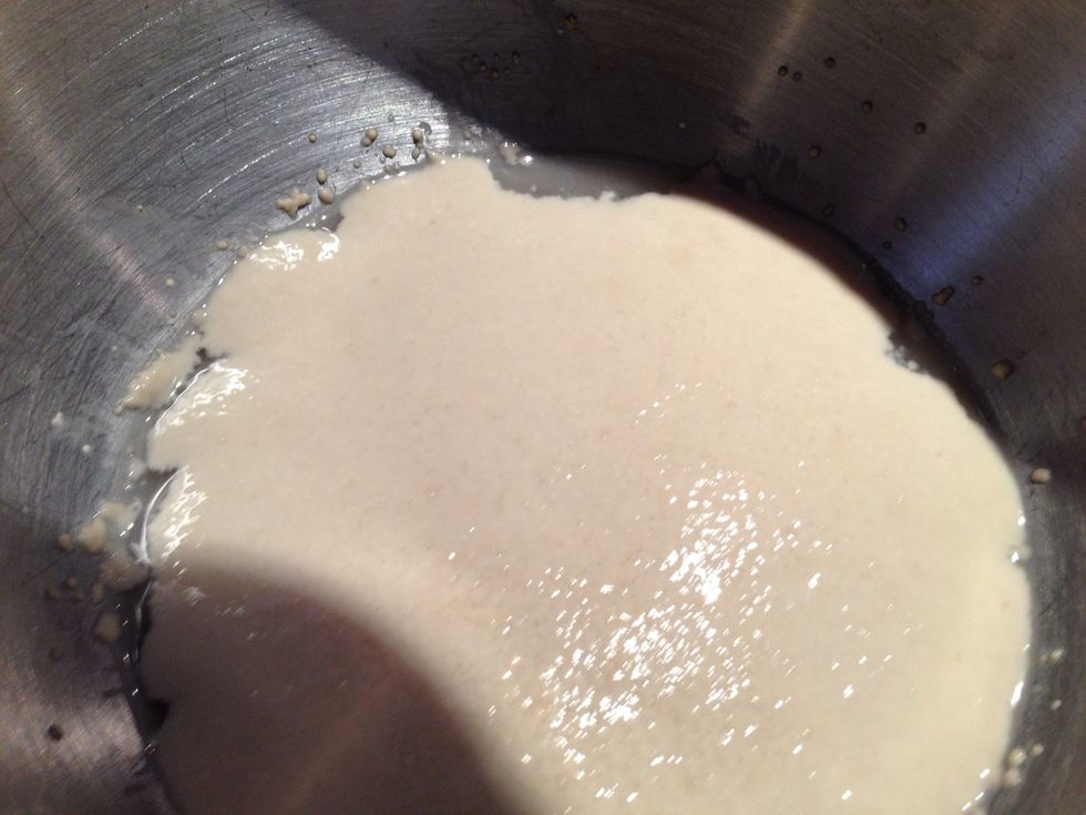 Combine water, yeast and sugar in mixer bowl, give it 5 minutes to foam up. Make sure the water temperature is within 100-115'.