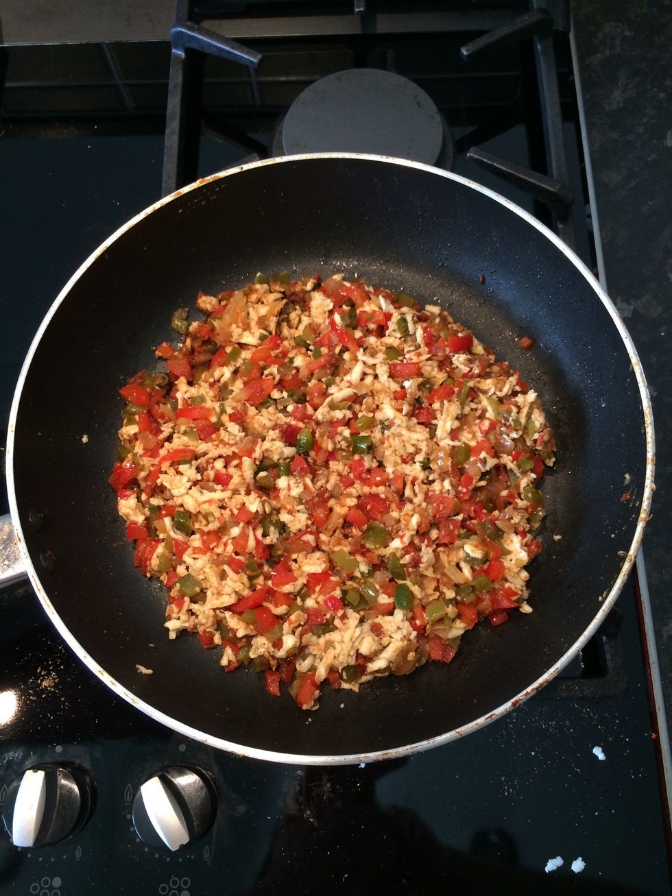 Combine with the grated paneer at low heat