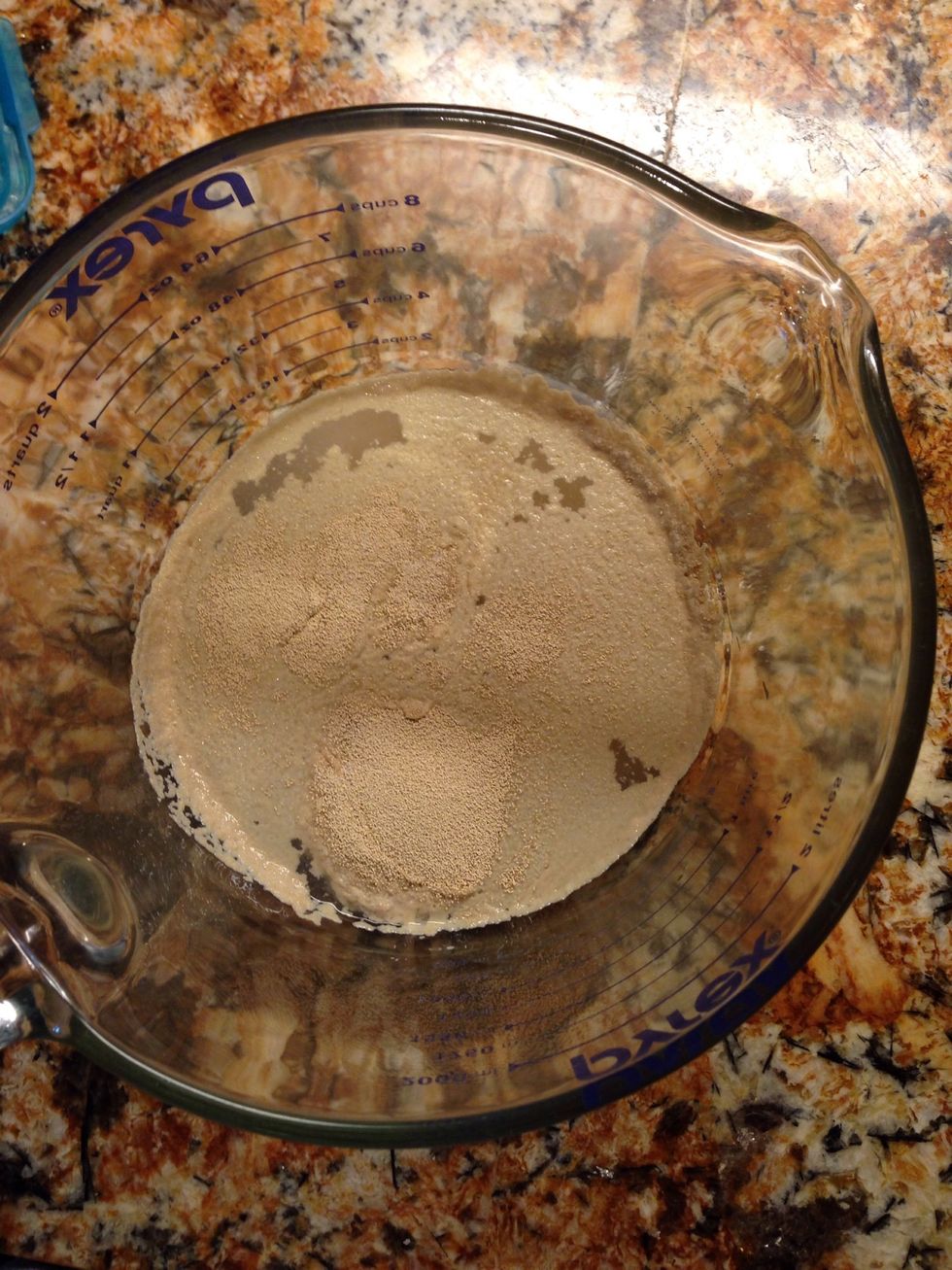 Combine yeast, water and 2 tsp sugar. Let sit for 10 min, then stir well.
