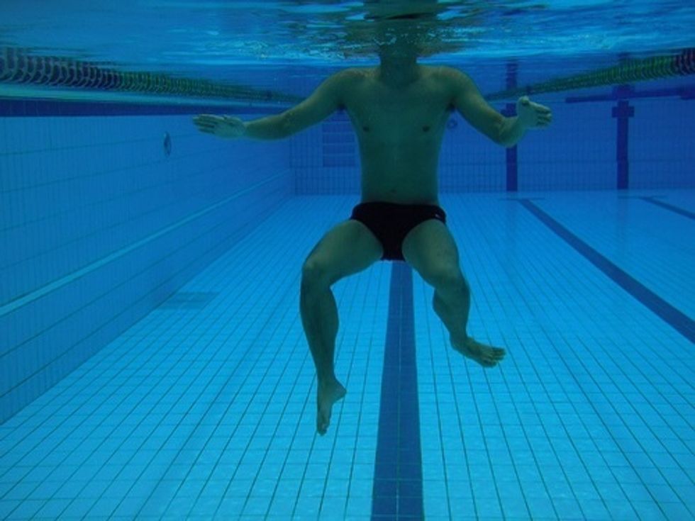 Combine your arms and legs to tread water.