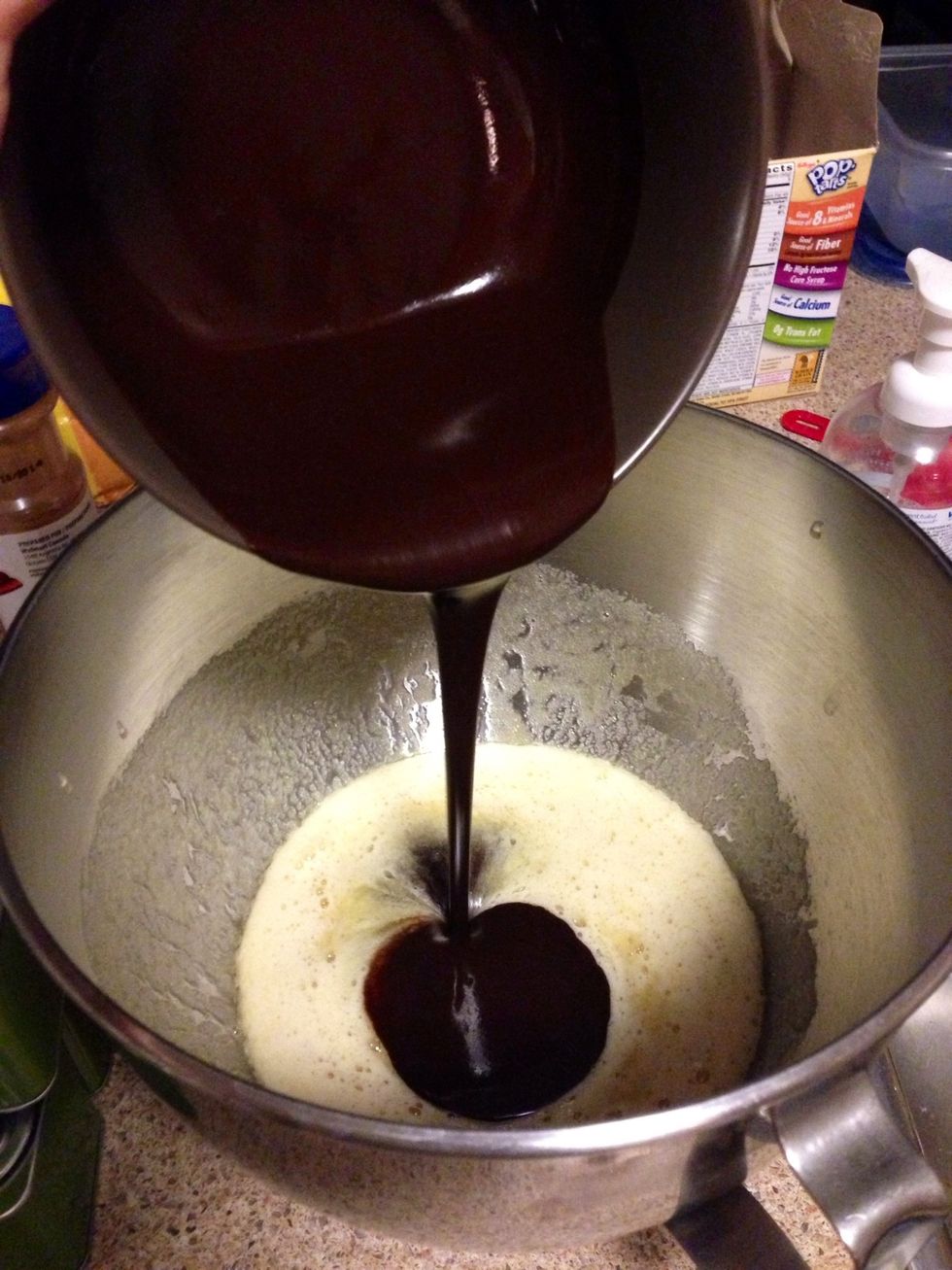 Combine your melted chocolate mixture to your other wet mixture and stir until both are fully combined. It's best to stir by hand to avoid over mixing.