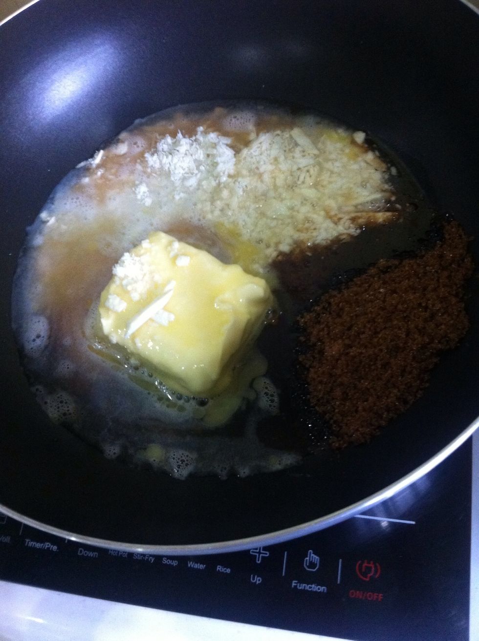 Combined butter, sugar, white chocolate, vanilla, golden syrup and hot water in the saucepan.