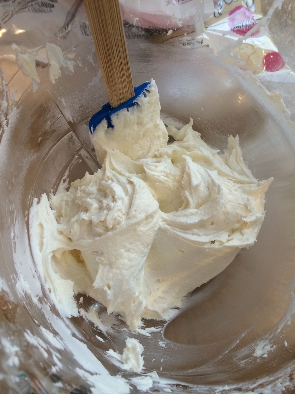 Combined powdered sugar 1 cup at a time scraping down bowl in between each addition
