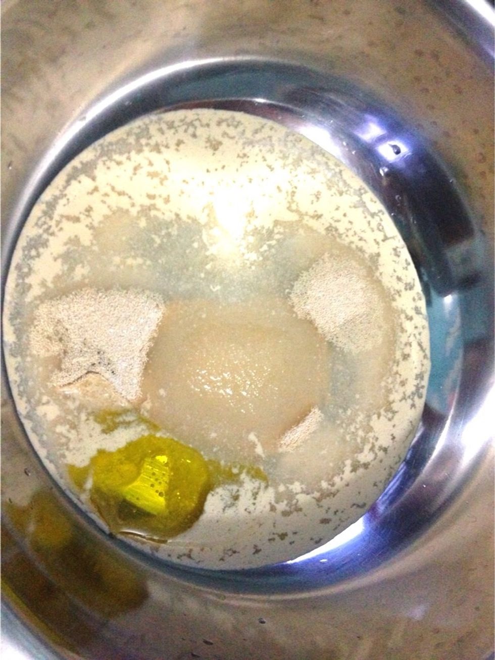 Combined together in a bowl. 1 cup and 3 tbsp of warm water. 1/4 cup of granulated sugar/honey/molasses. 2 tbsp of instant dry yeast and 1/3 cup of extra virgin olive oil. Let them rest for 15 mnt