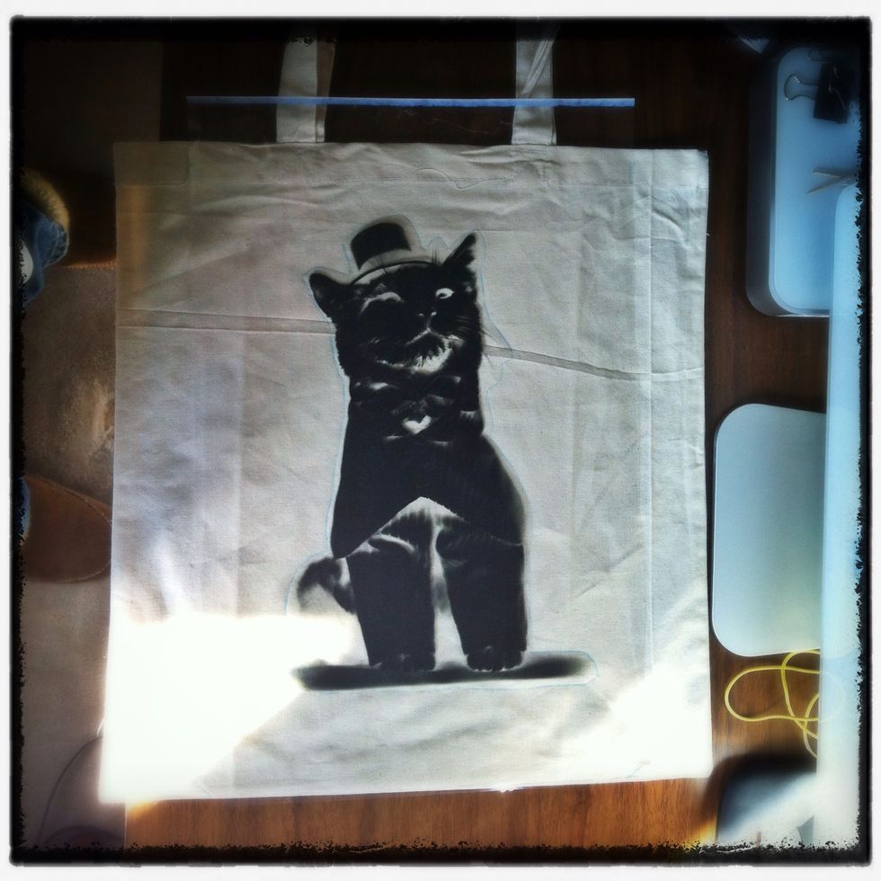 Compare the negative to the outline and make registration marks. Apply the dye using the outline as a guide. Be sure to evenly saturate inside the line and then lightly brush some around the outside.