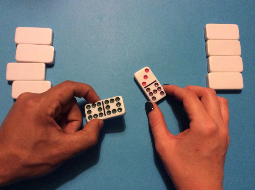 Comparing numbers: Pair up students. Each student receives 10-30 dominoes face down. Then the players each turn over one domino. The person whose domino has the most dots gets to keep both dominoes.