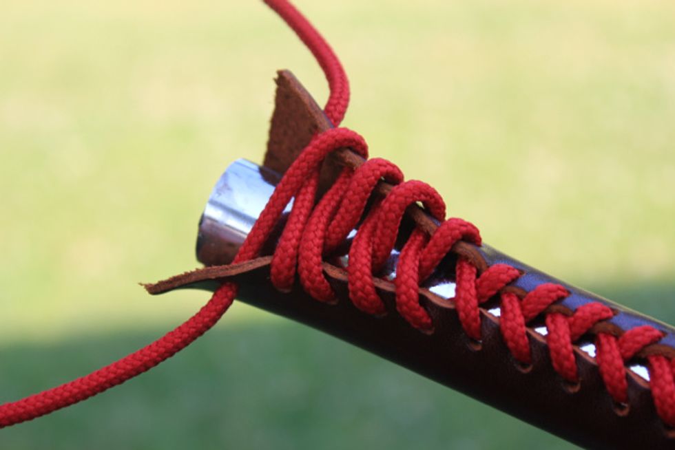 Complete the lacing (as in step 14).