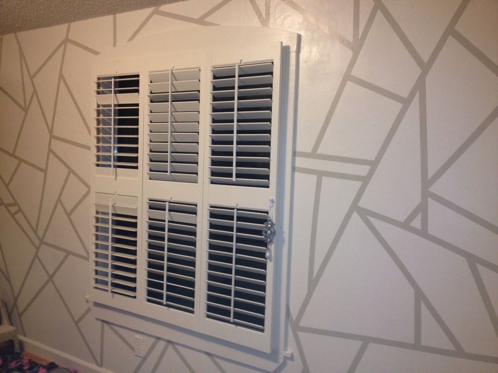 Completed geometric shapes on my wall.