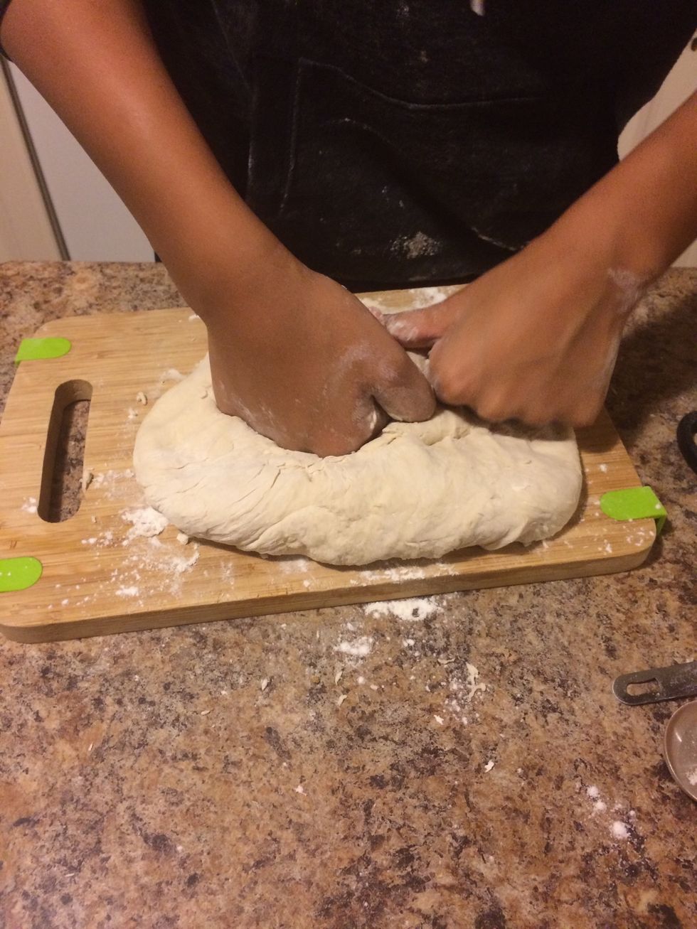 Completely mix the mixture and continue to pound out on wooden board.