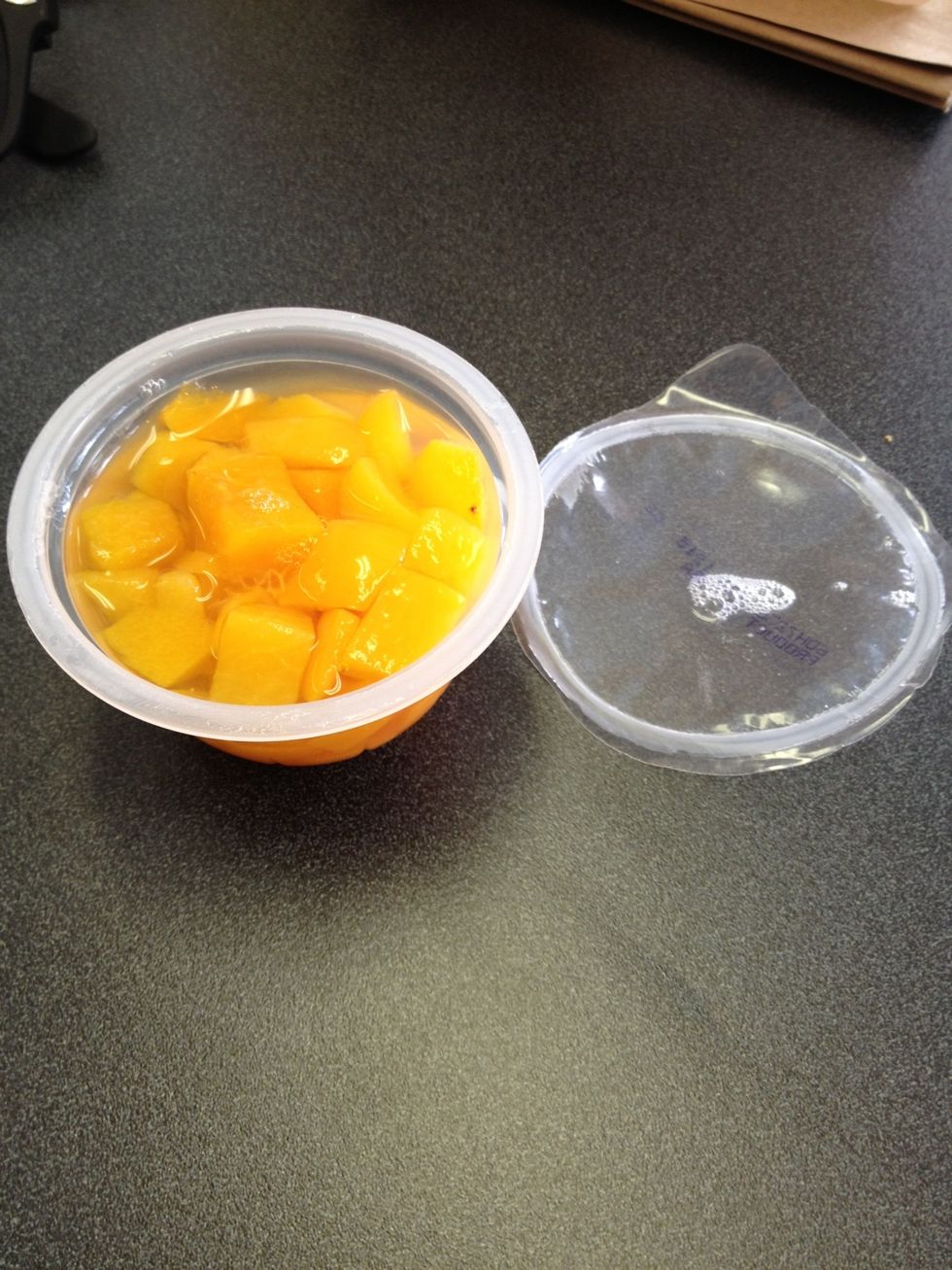 Completely remove the plastic cover and enjoy your delicious fruit cup.