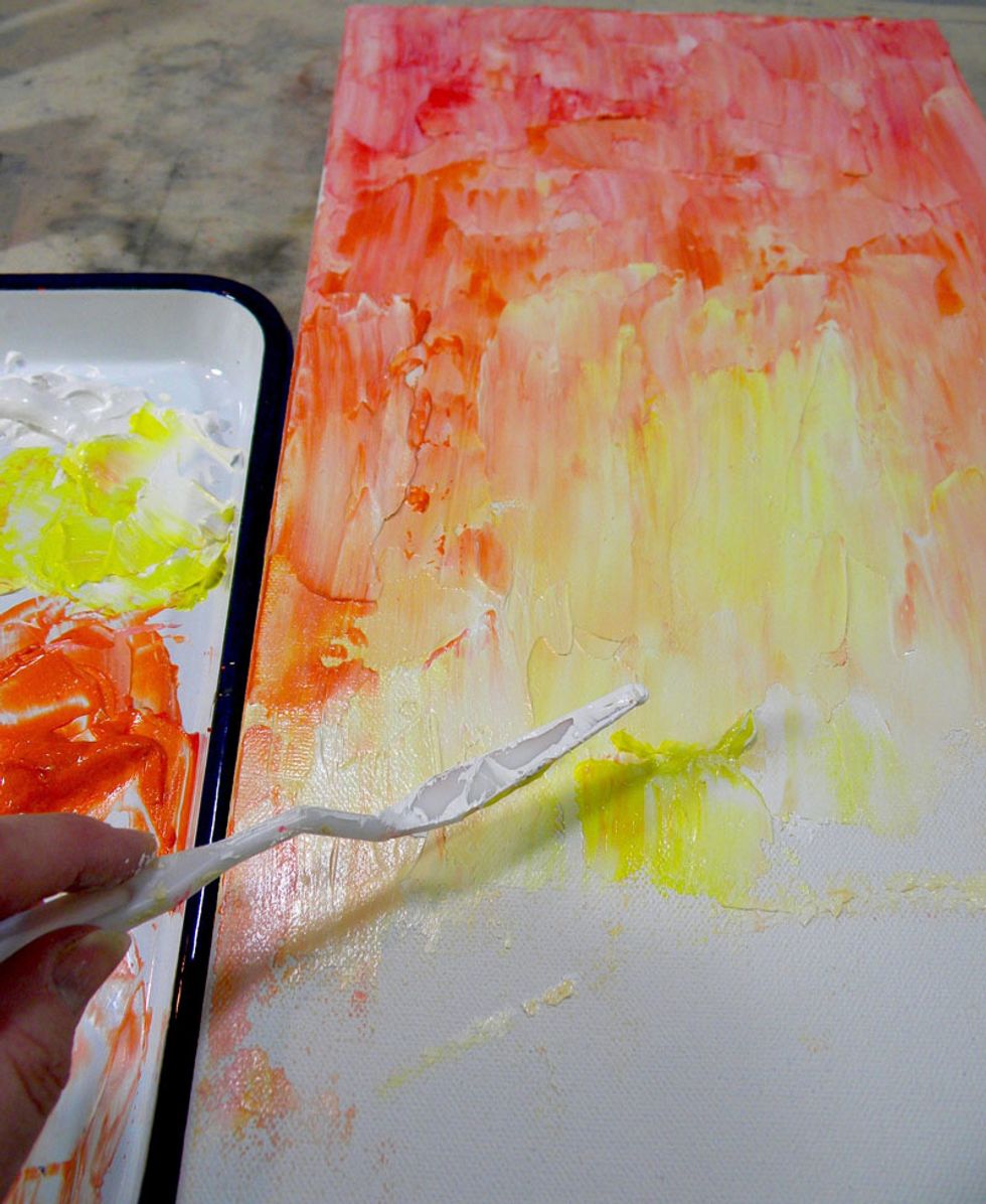 Concentrate Lemon Tart in the middle of the canvas adding Tango, Persimmon. Fiesta and Rhodolite with gesso to the top and edges.  I also added a bit of Coral Sorbet for shimmer.