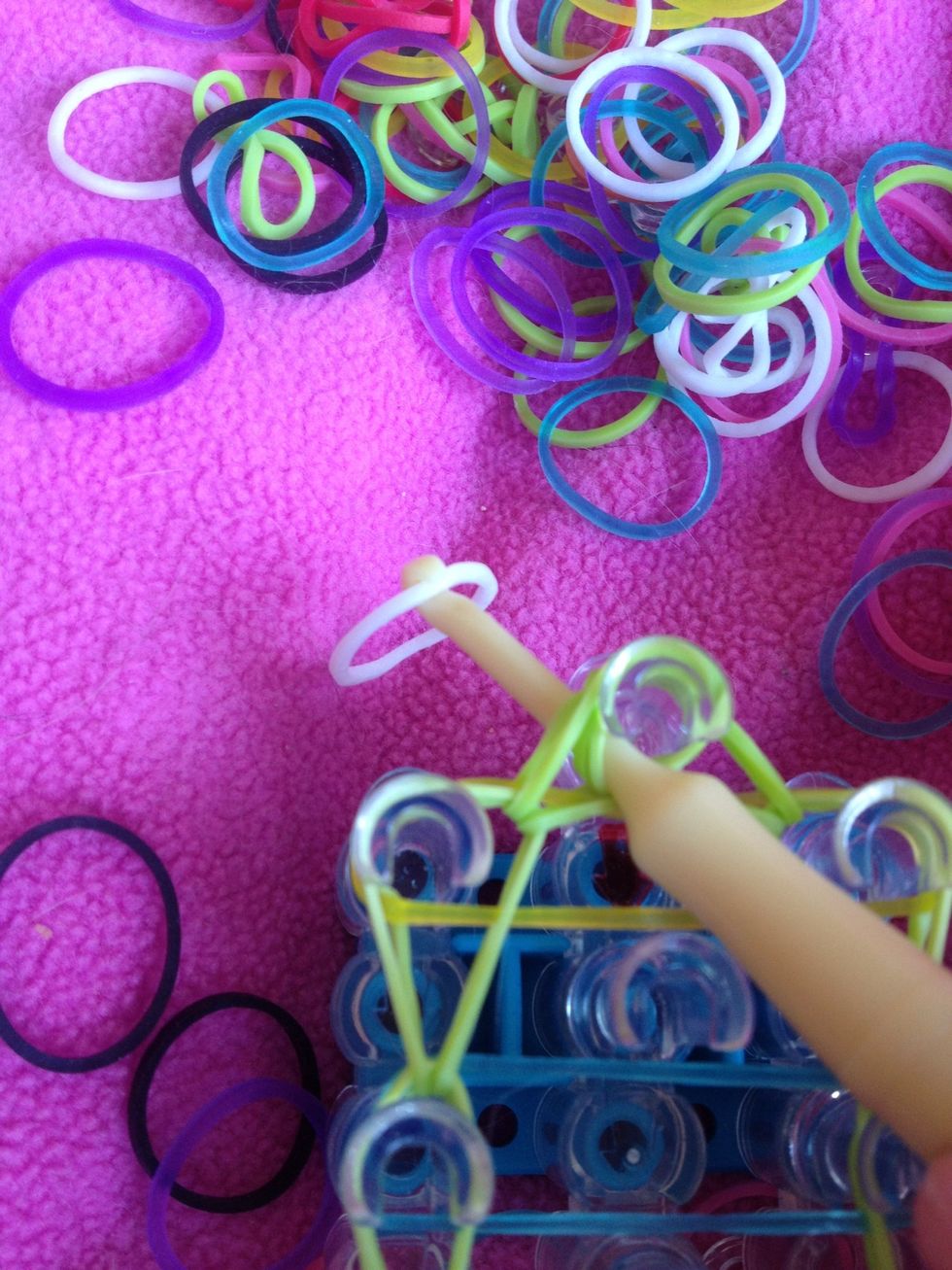 Connect a rubber band to the hook