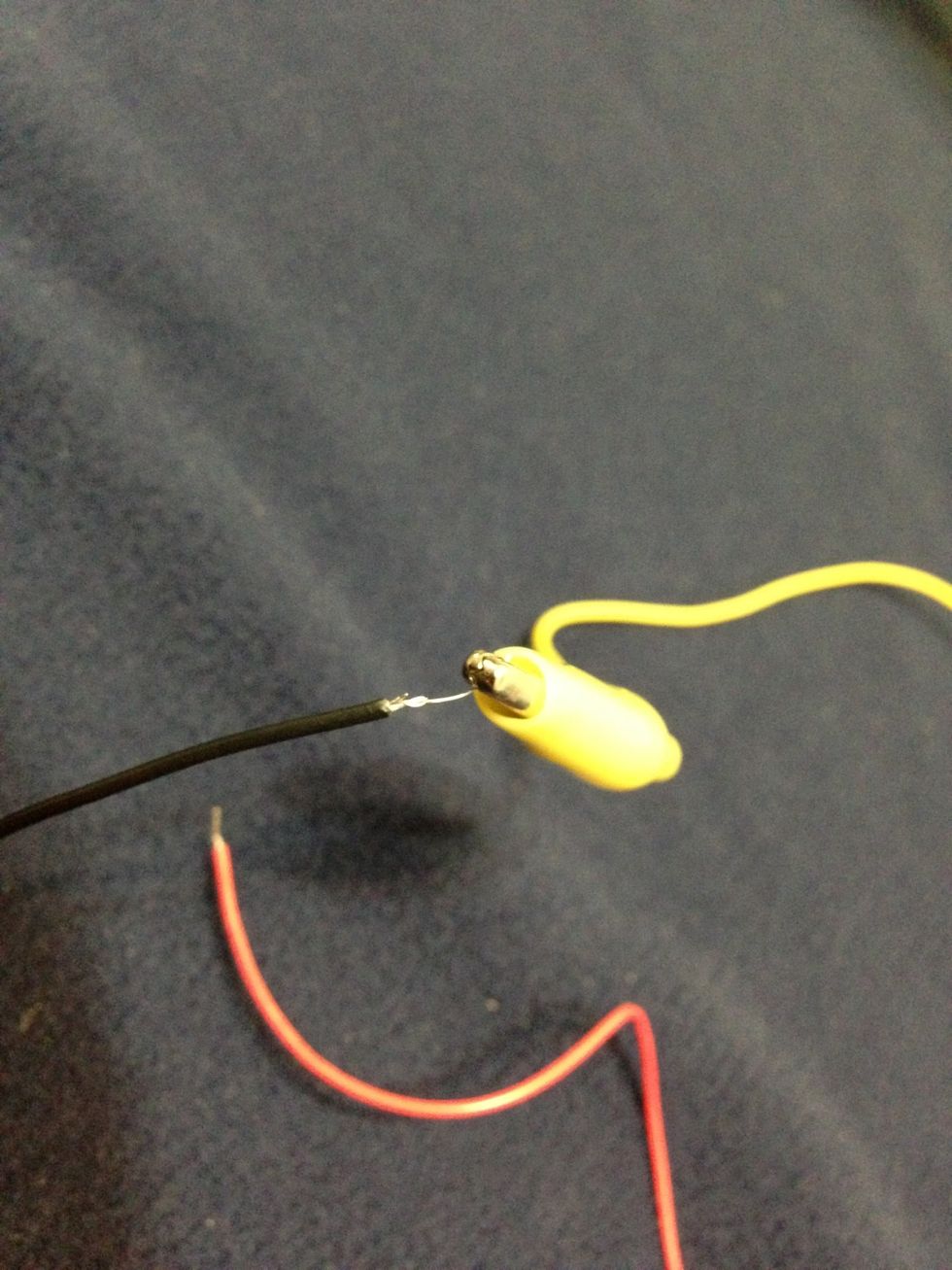 Connect an alligator clip to the copper wire.