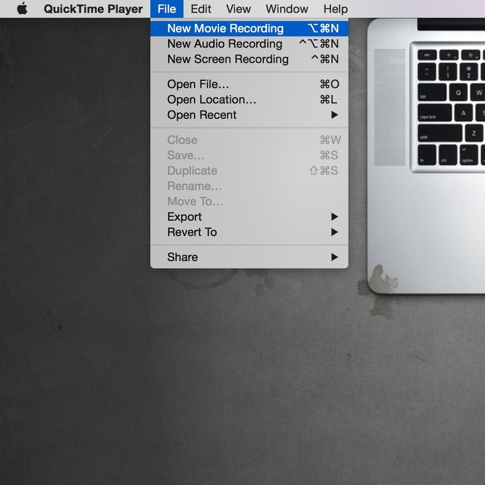 Connect iPhone to computer using USB lightening cable. Choose file and new movie recording.