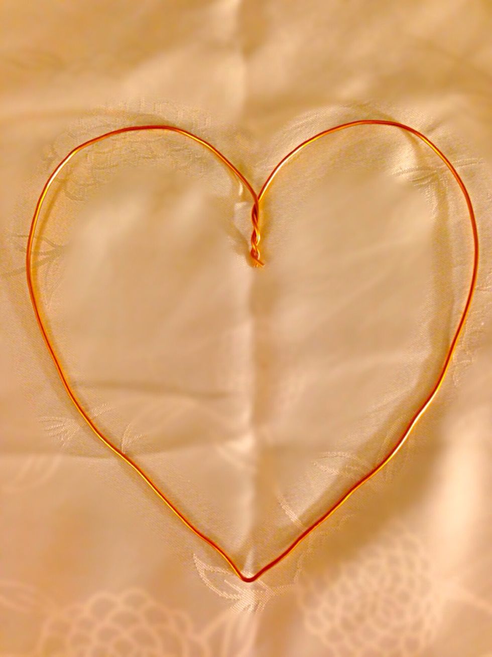 Connect the ends and make heart shape